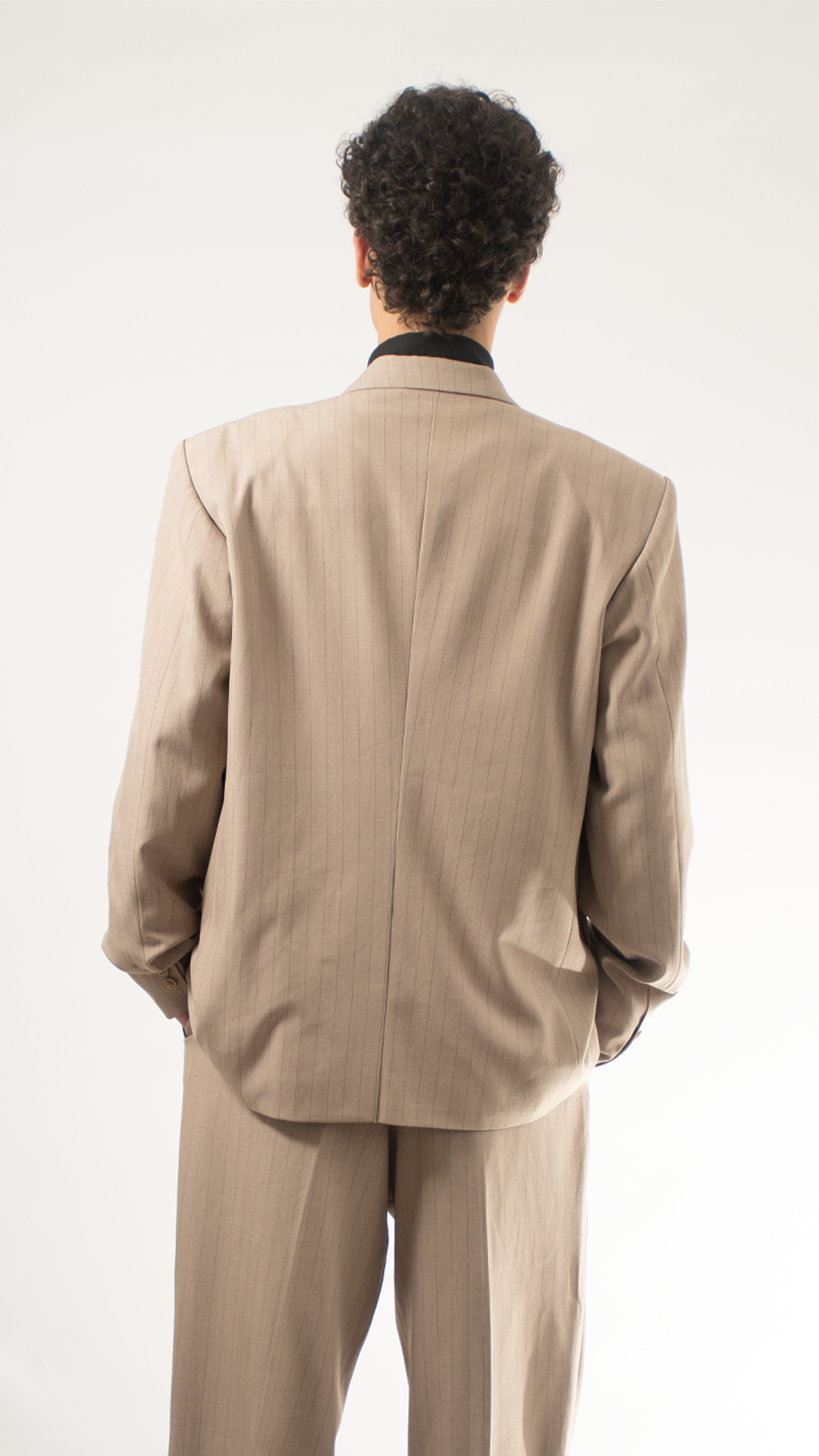 Traje de sastrería beige